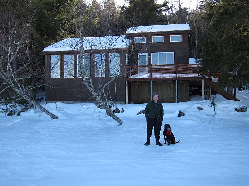 House from frozen lake